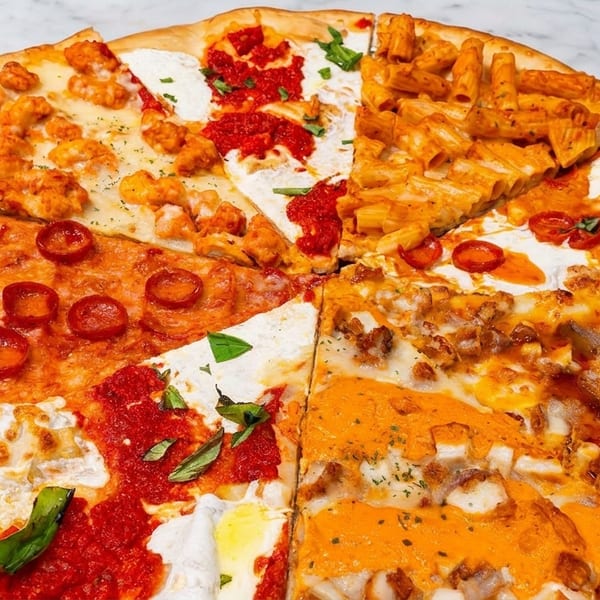 A large pizza with eight different slices, each featuring a unique topping combination.