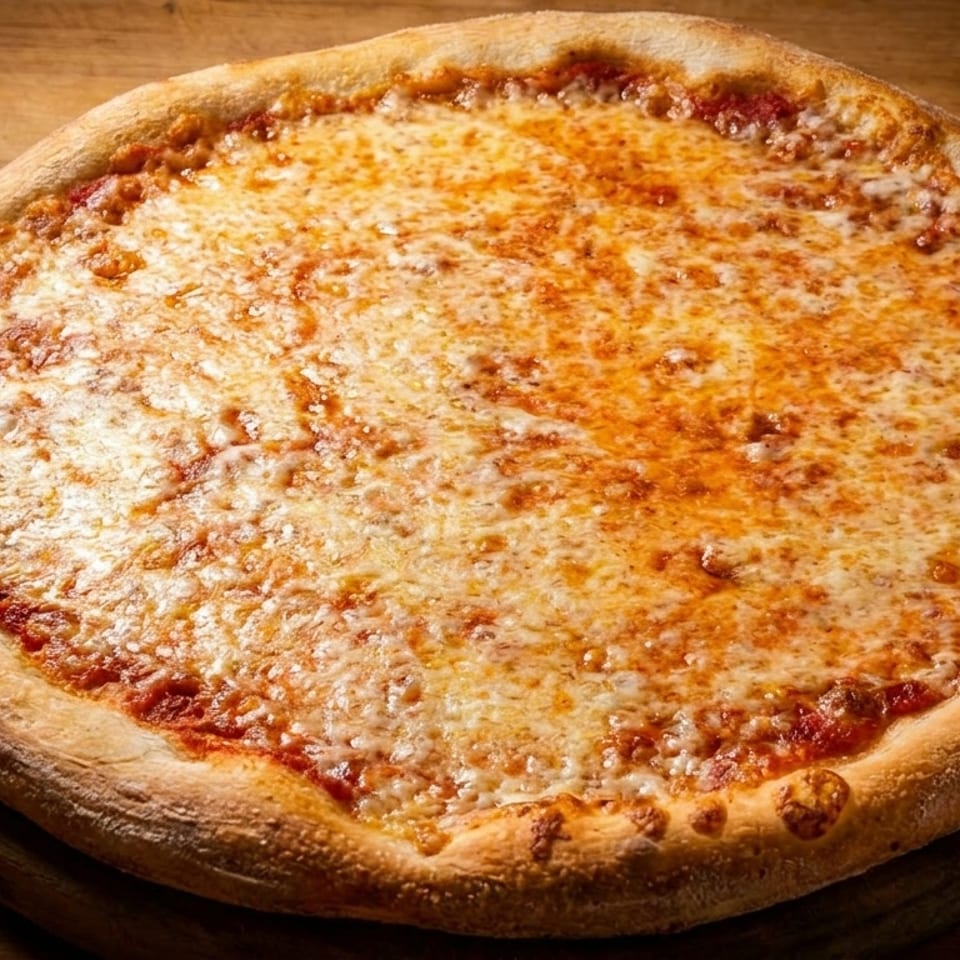 Classic cheese pizza with melted mozzarella and tomato sauce on a wooden serving board.